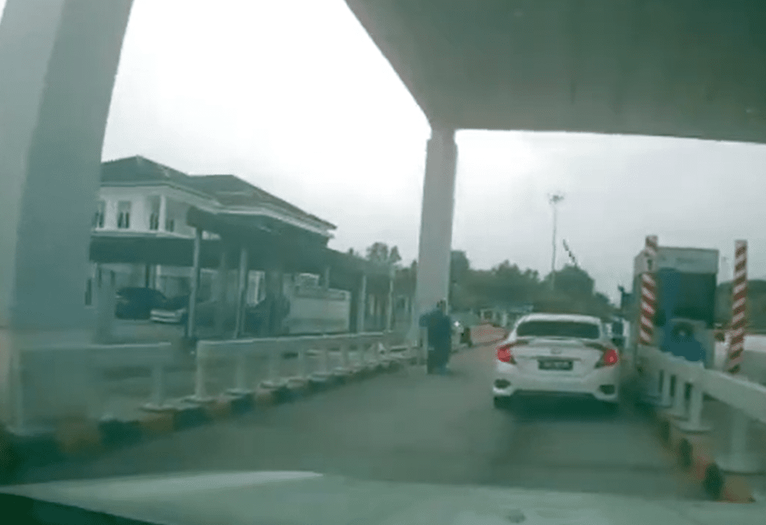 Motor trying to zip through toll