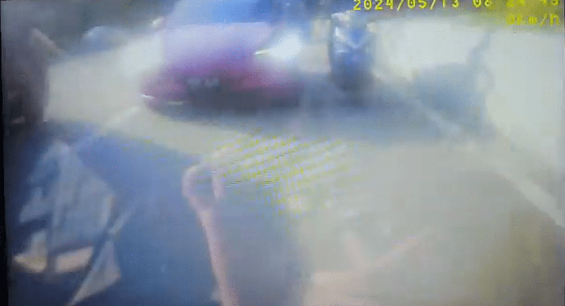 Motorcyclist hits Tesla's side mirror