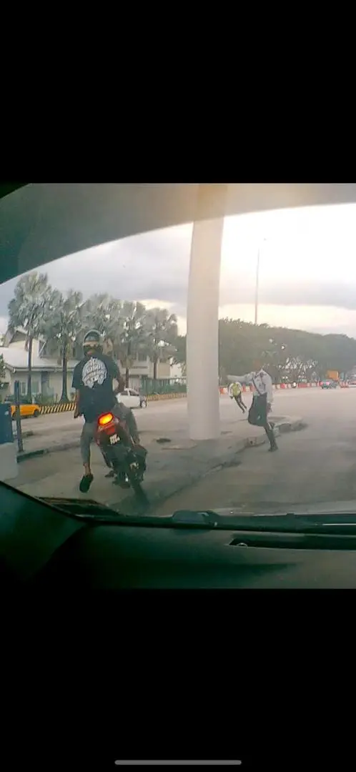 motorcyclist trying to avoid policemen