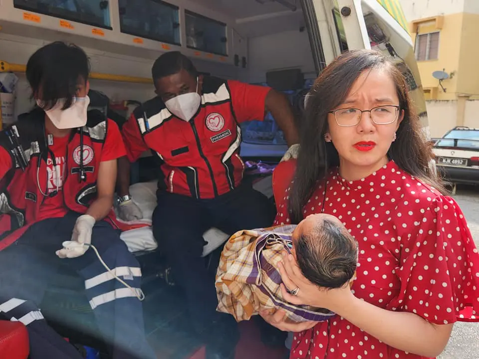 Subang Jaya ADUN Michelle Ng holds abandoned baby