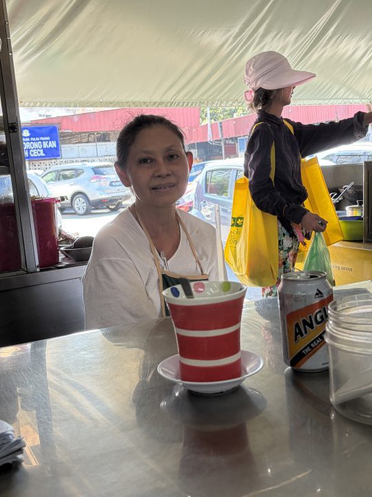 Ms Wong at Lebuh Cecil market