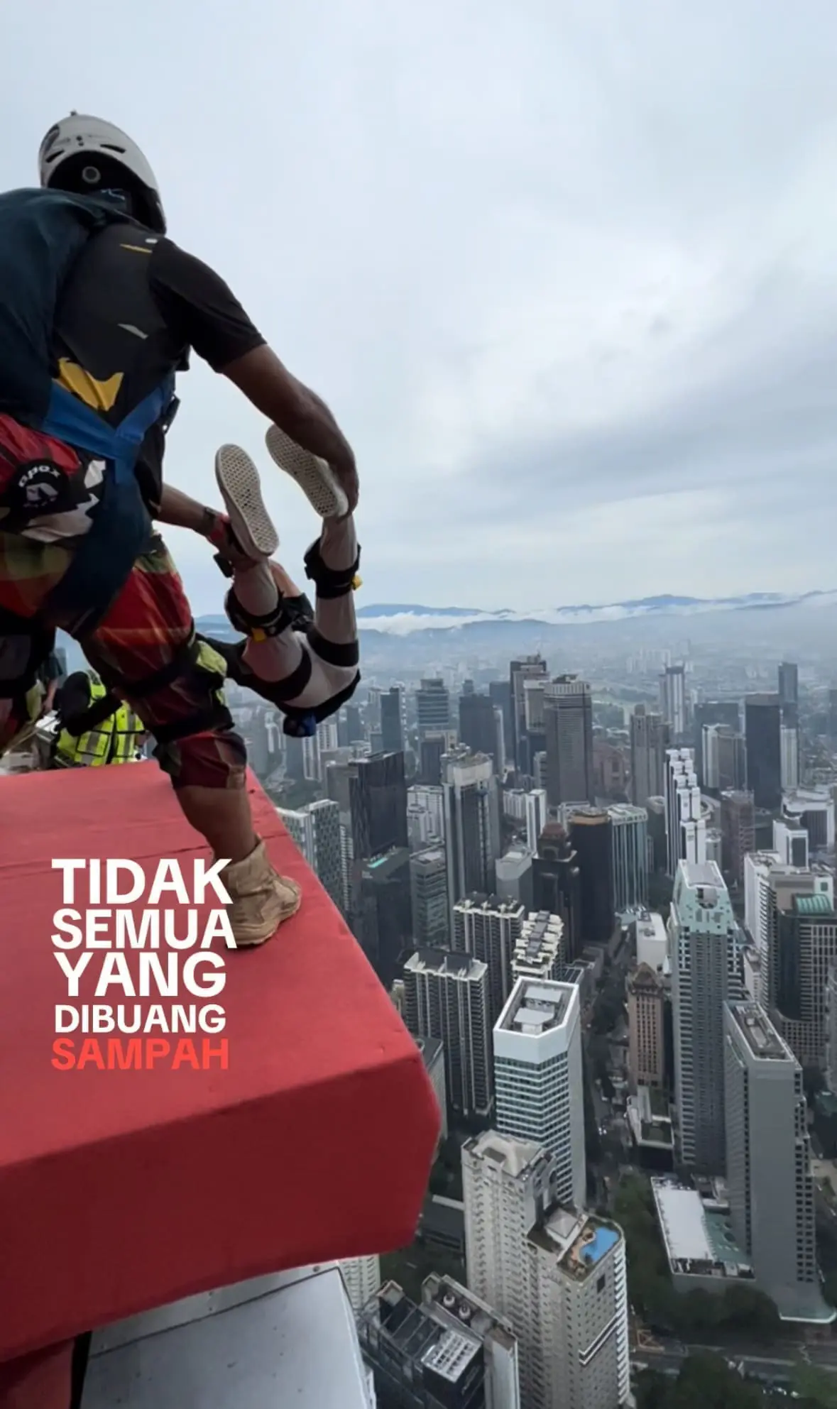M'sian BASE Jumper Shows Peace Sign While Getting Hurled Off KL Tower