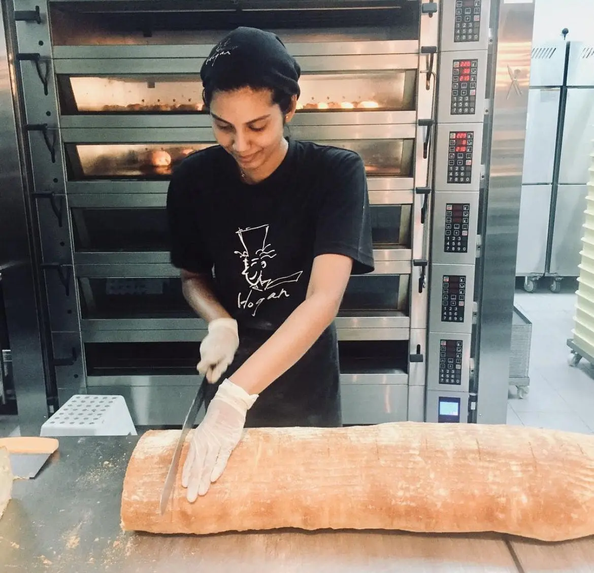 msian girl cutting bread