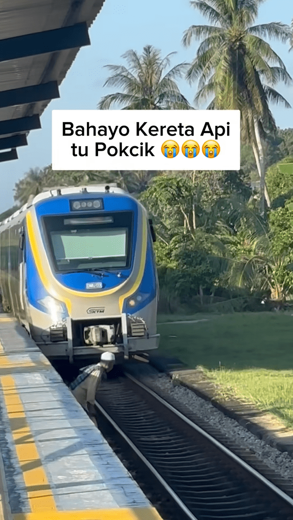 M'sian man emerges from corner of platform