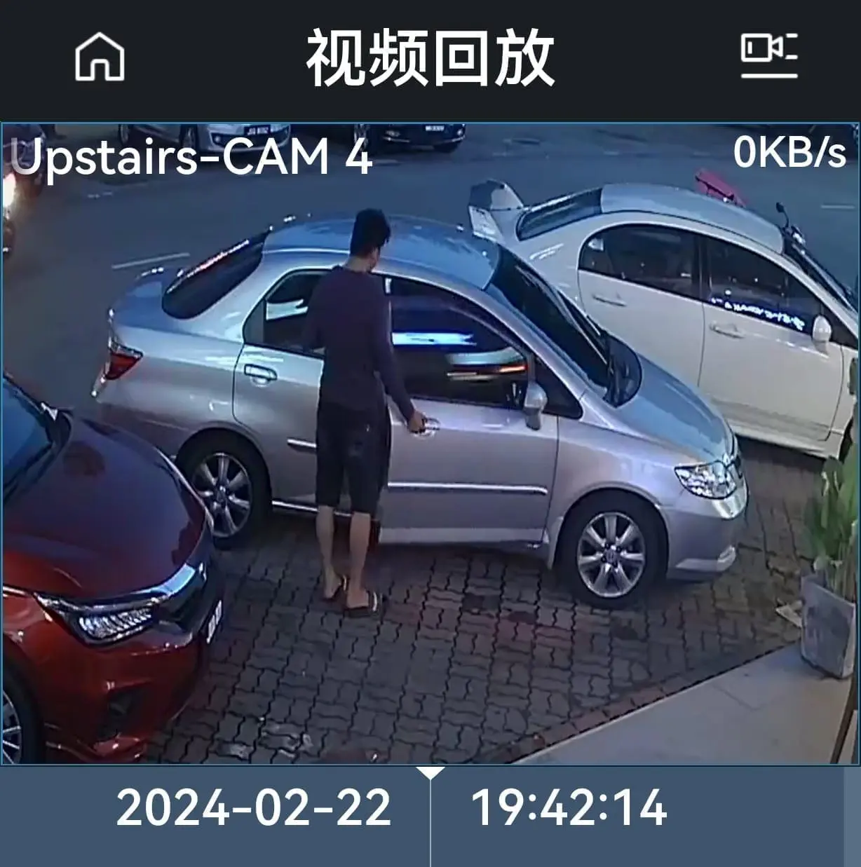 msian man opening his car door