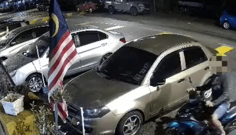 M'sian man stops outside a house in KL