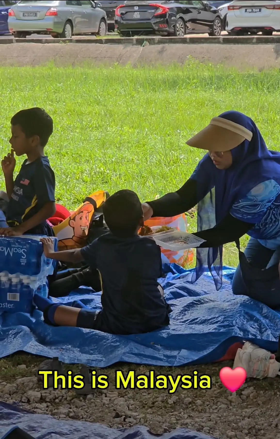 M'sian Teachers Touch Hearts By Lovingly Feeding Students During Football Tournament