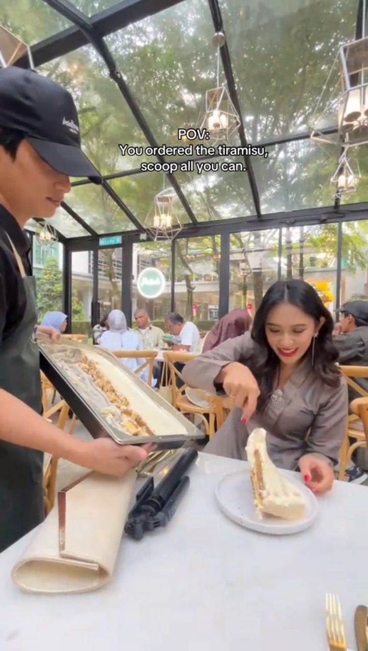 msian woman scoops tiramisu in all you can scoop viral promo kl cafe pic2