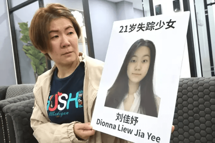 M'sian woman shows photo of daughter