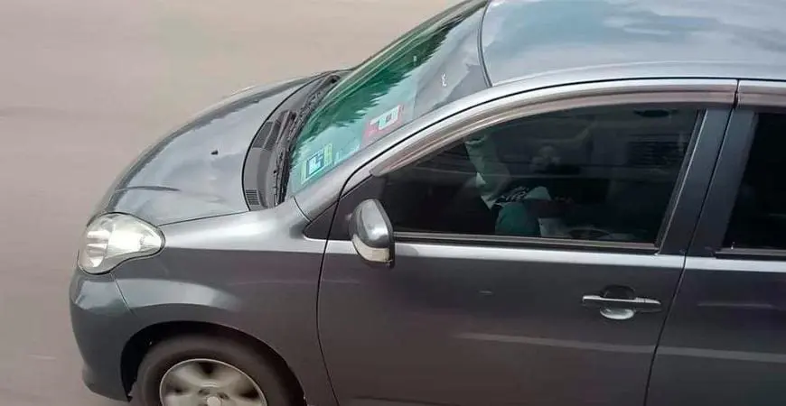 M'sian woman seen resting her head on driver's lap inside a Myvi