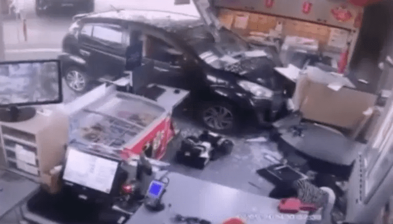Myvi crashes into convenience store at Ipoh petrol station