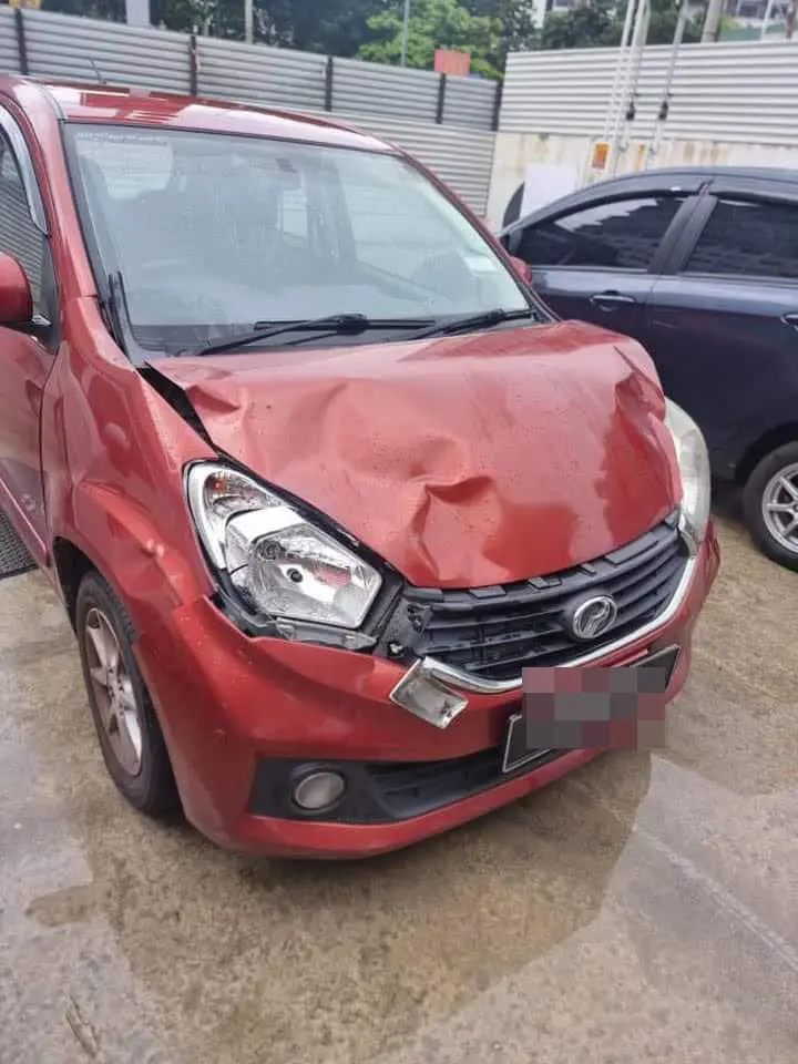 Myvi hit by cow