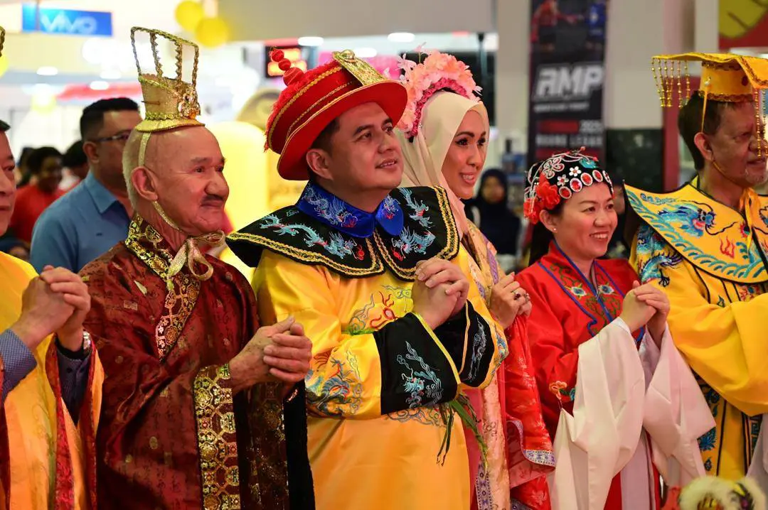 Najib Son attending event