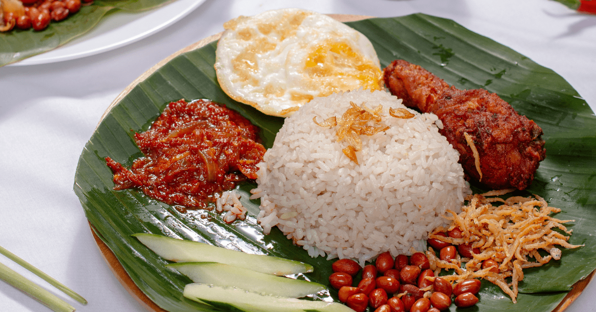 nasi lemak on a banana leaf