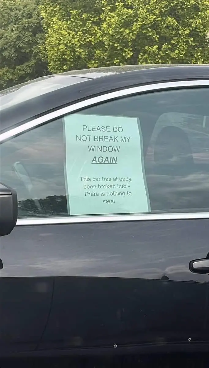'Nothing to steal' sign on car window