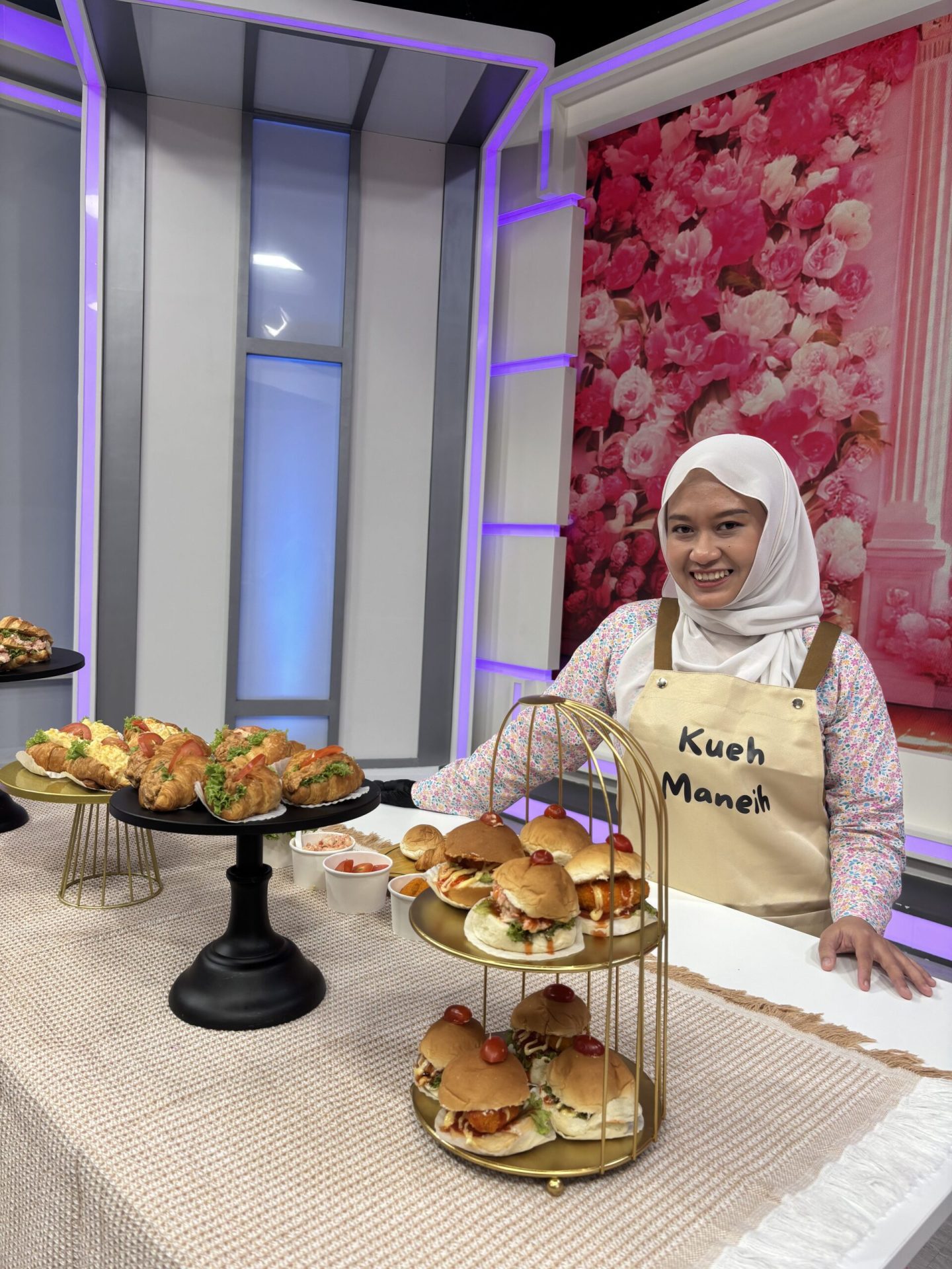 Nur Syafieqa Aziela at an event with her dessert table