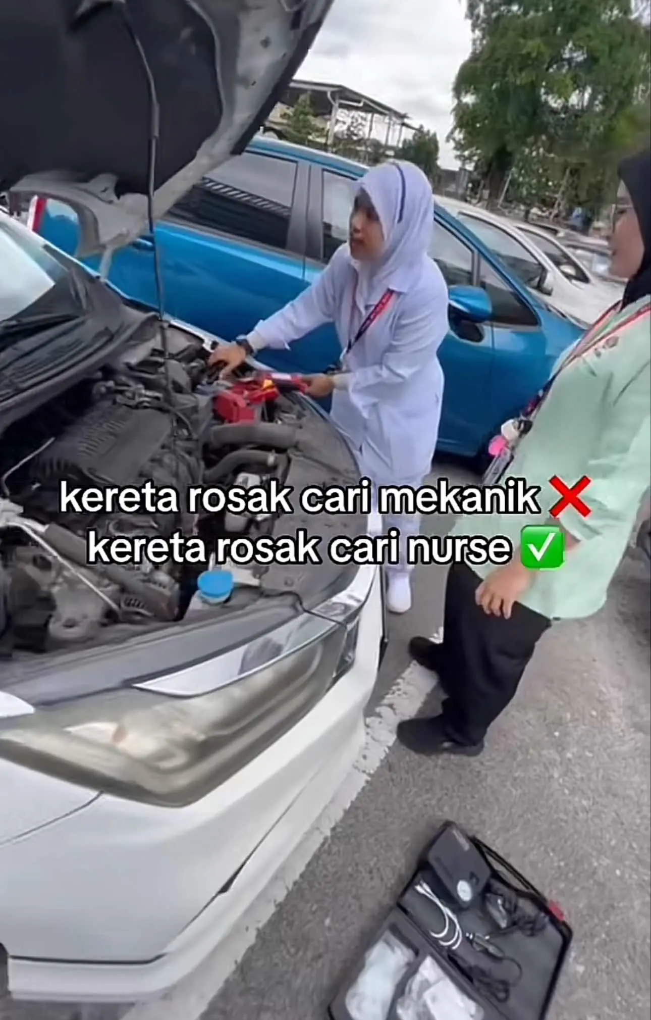 Nurse fixes stalled car in parking lot