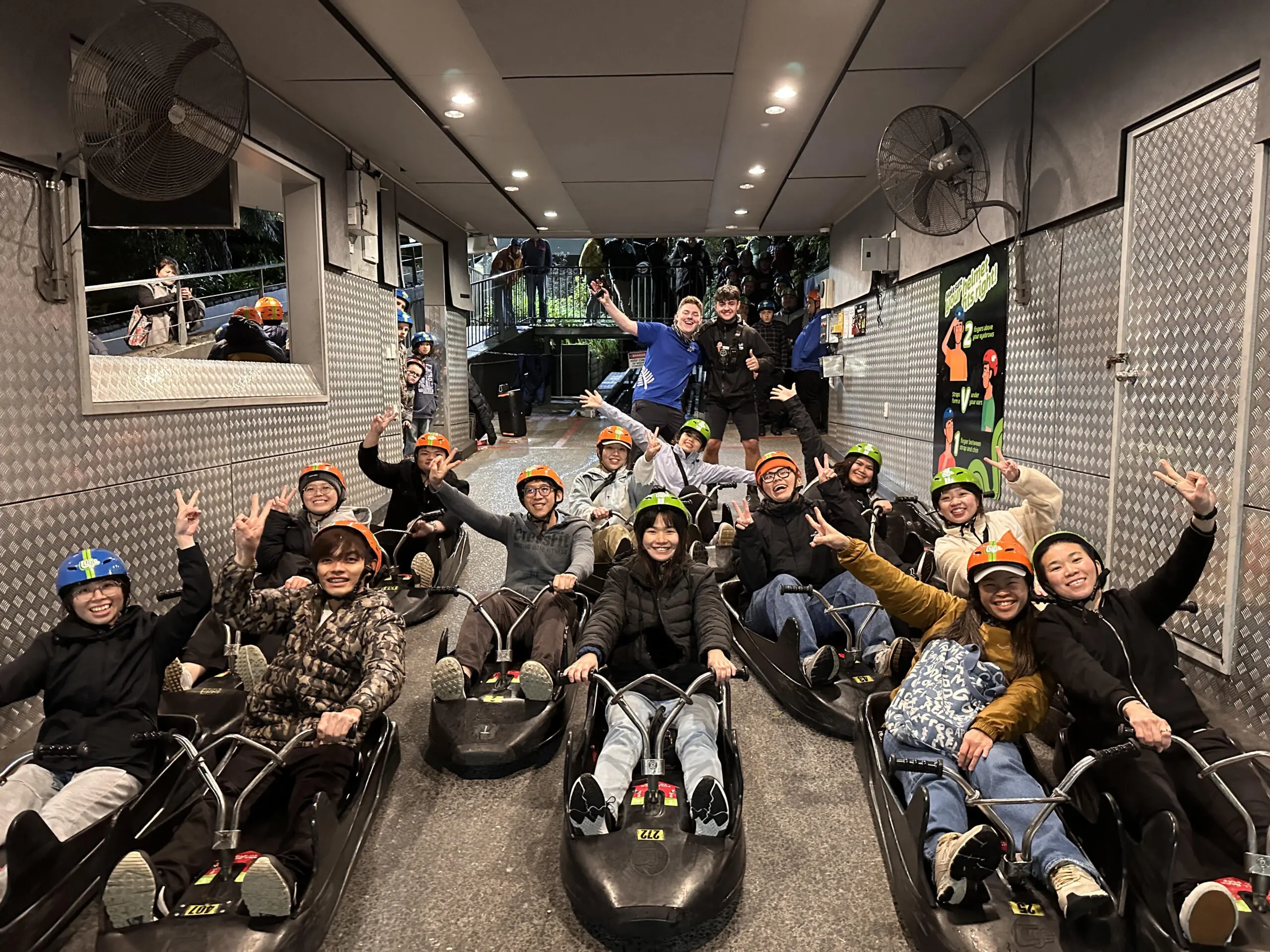 Kay at go kart course in New Zealand with friends