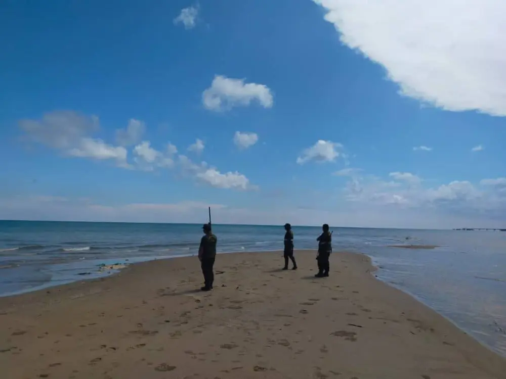 Officers watching the beach in Sabah