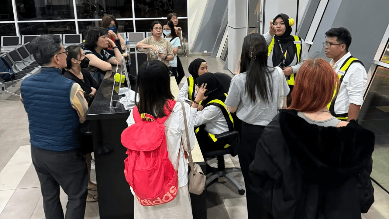 Passengers complaining to flight staff