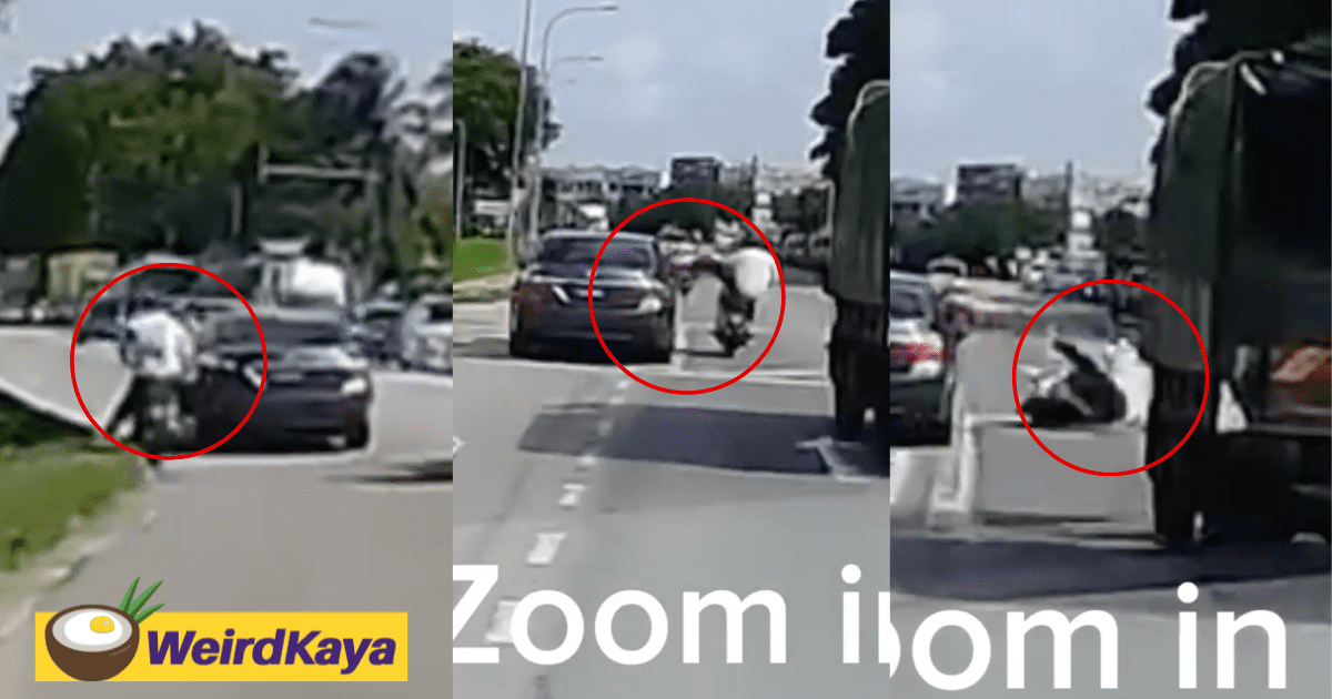 Penang Motorcyclist Nearly Crushed By Lorry After Kicking A Car Which Almost Hit Him