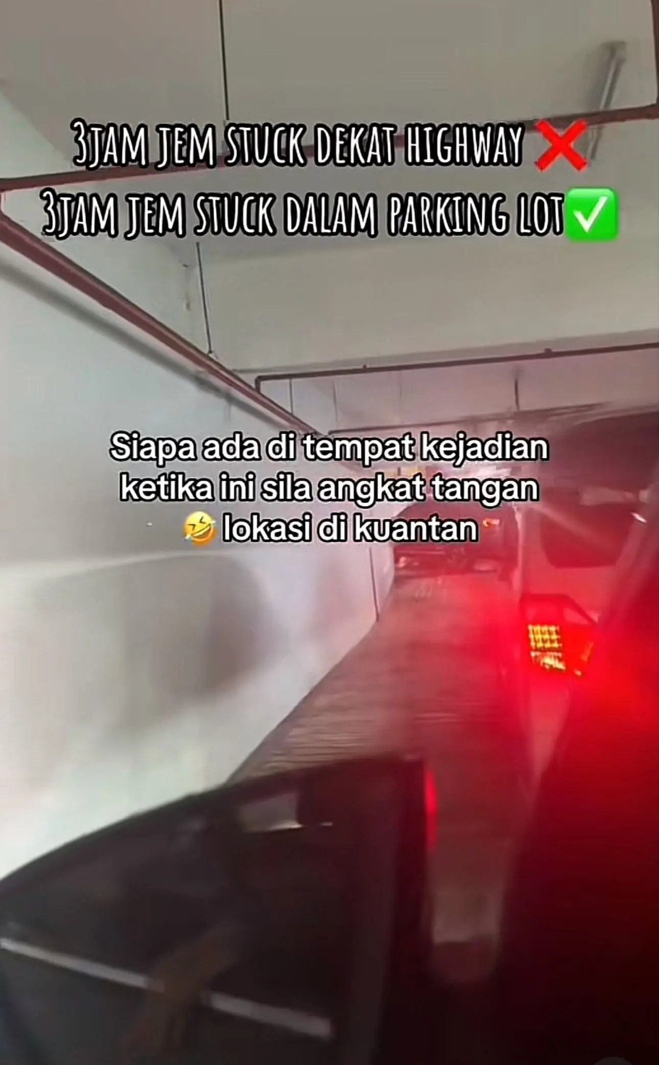 People in car waiting while other cars ahead of them stood still during jam