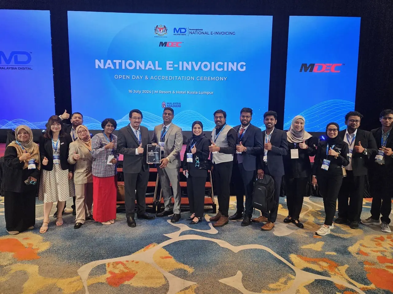 Celebrating MDEC Accreditation Milestone with MDEC Director Mr. Saiful Izwan Mohd Shazali and the MDEC Team.