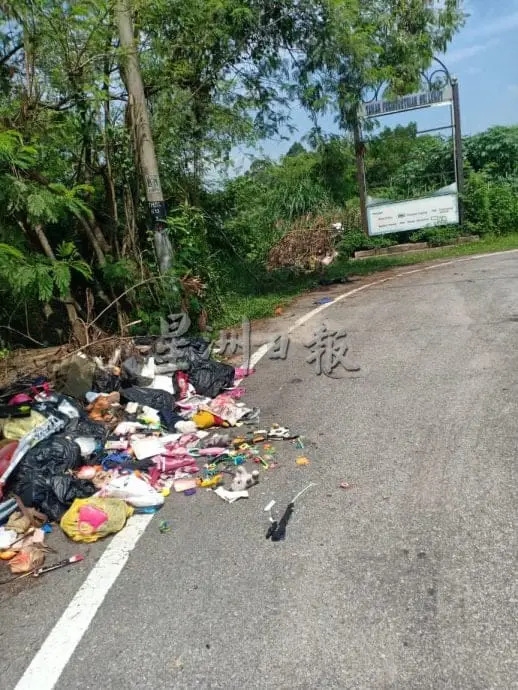 piles of rubbish at a roadside