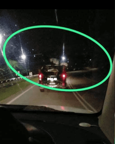 'Pocong' Spotted Hitchhiking A Ride On Top Of Police Car In Rembau