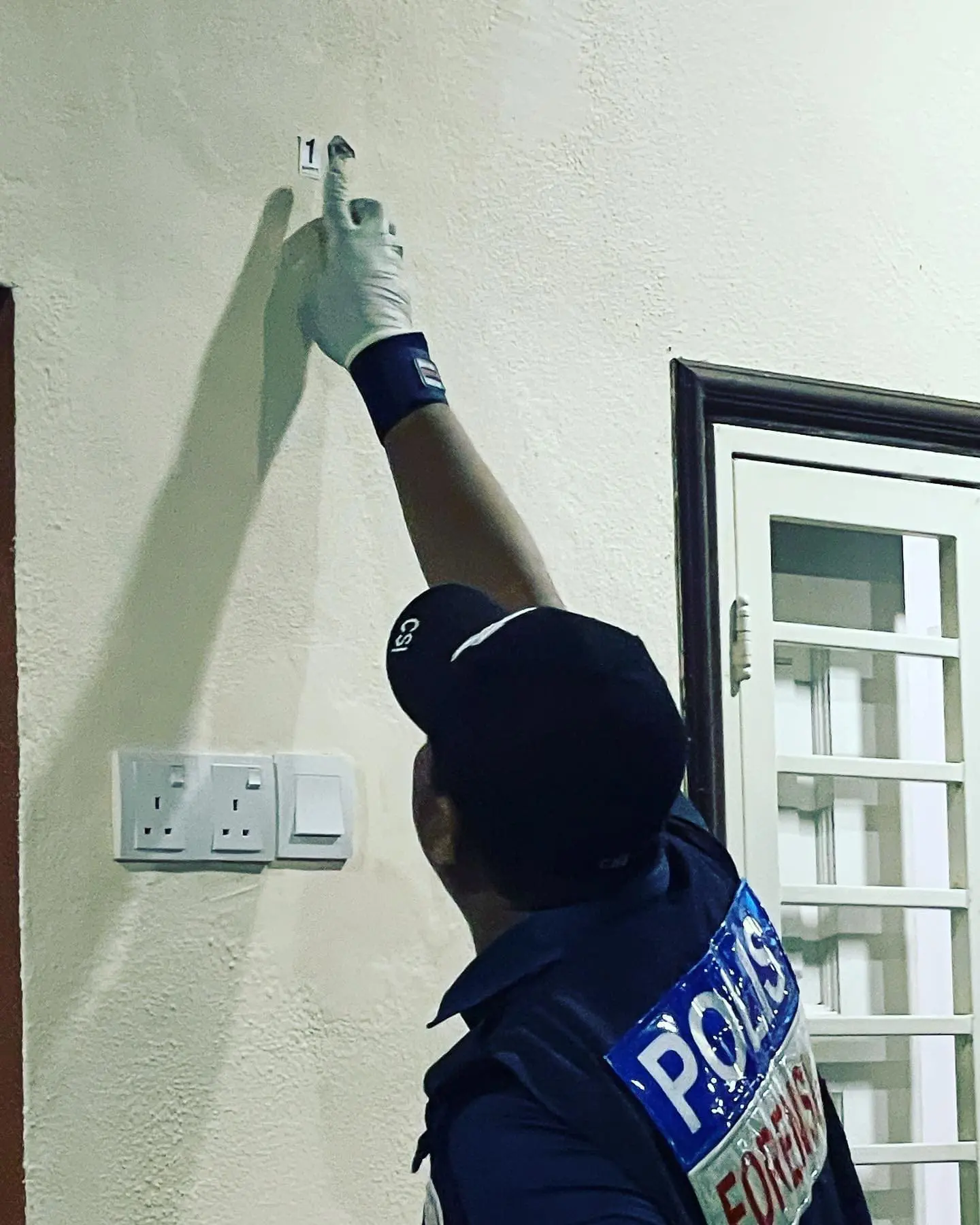 Bullet hole at MyFM DJ Aki's house