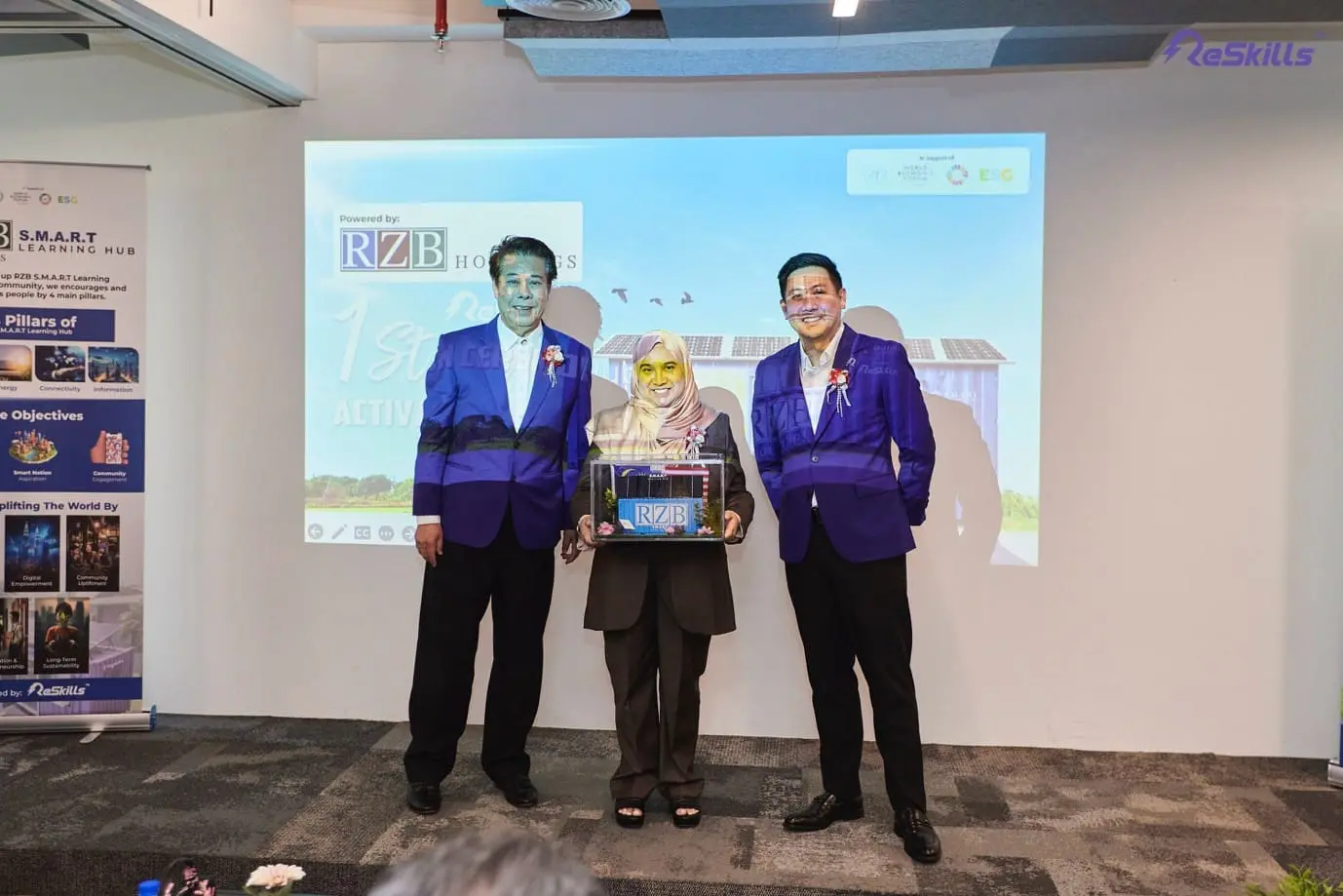 Reskills S.M.A.R.T Learning Hub token of appreciation passing