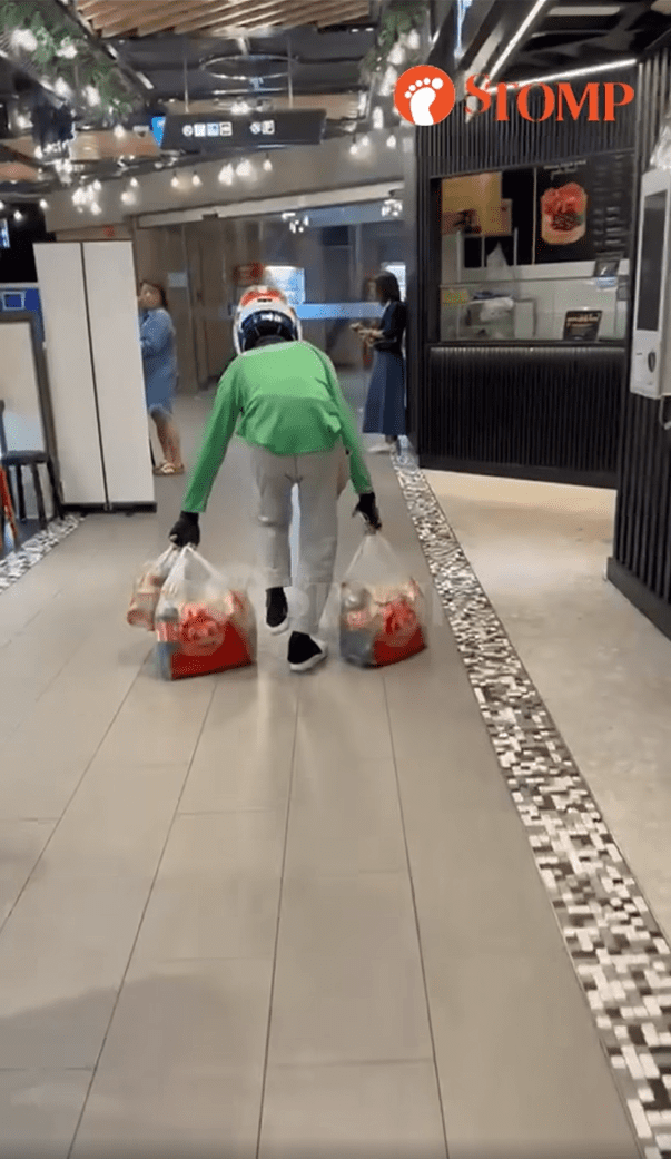 Rider drags food order to carpark