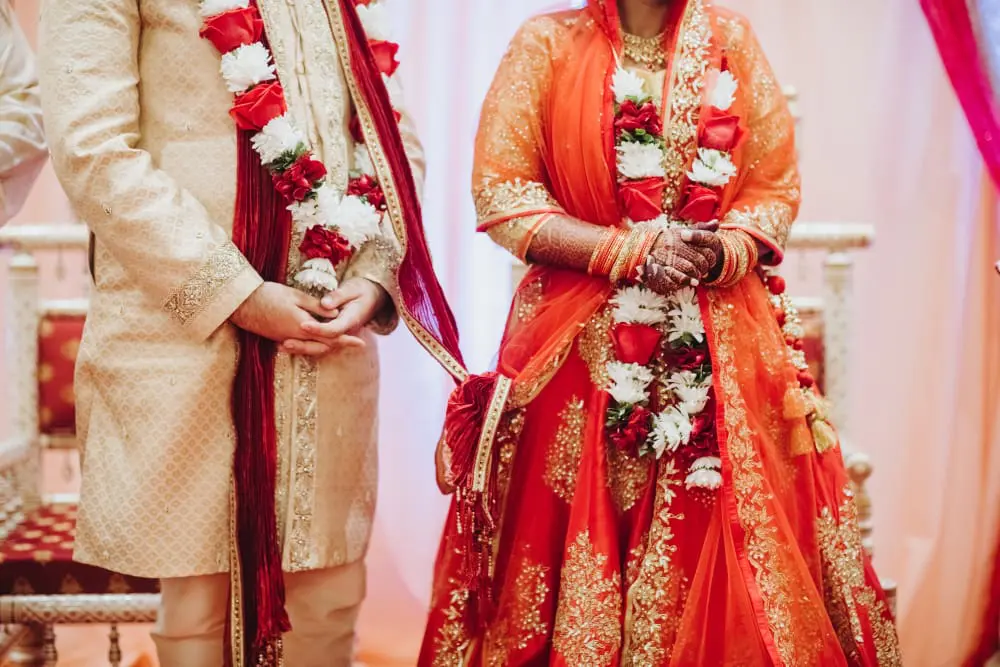 ritual-with-coconut-leaves-during-traditional-hindu-wedding-ceremony