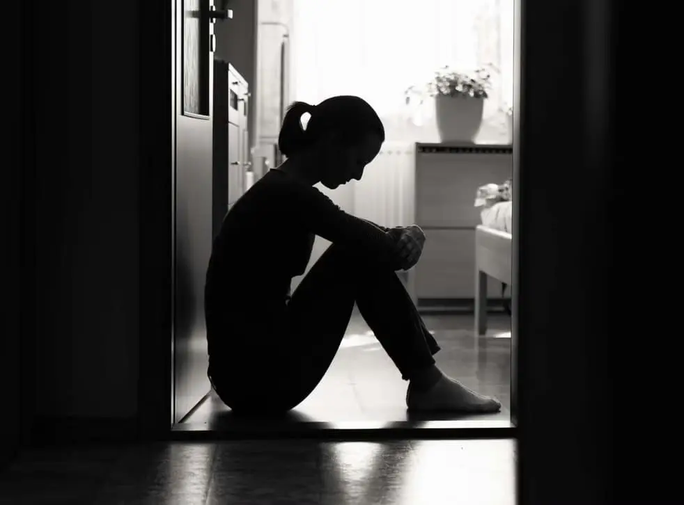 Woman sitting in BNW background