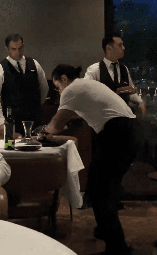 Salt Bae slicing steak for customer