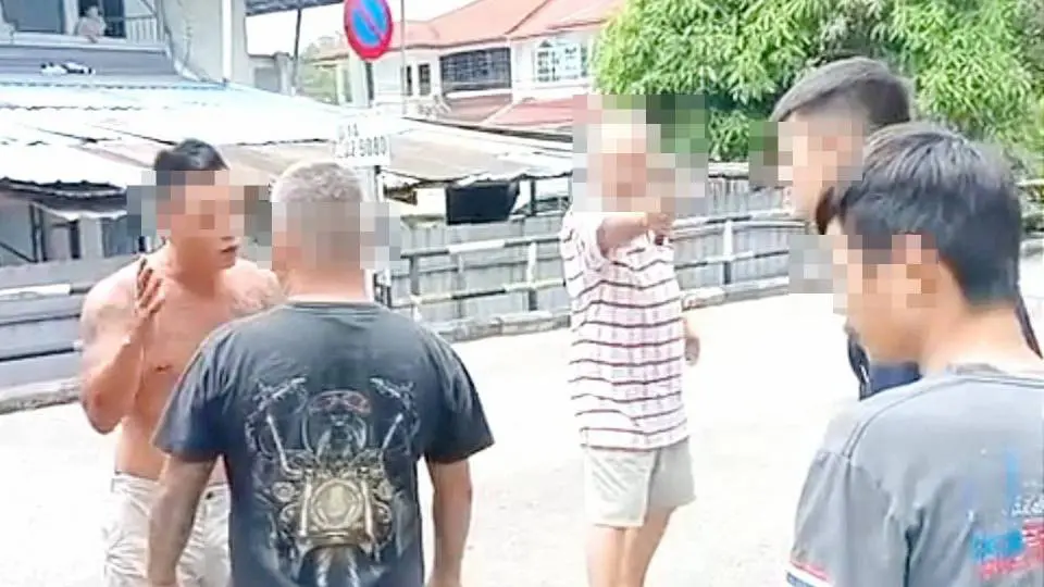 Malaysian father and son arguing with people using meat cleaver over loud noise in Sibu Sarawak
