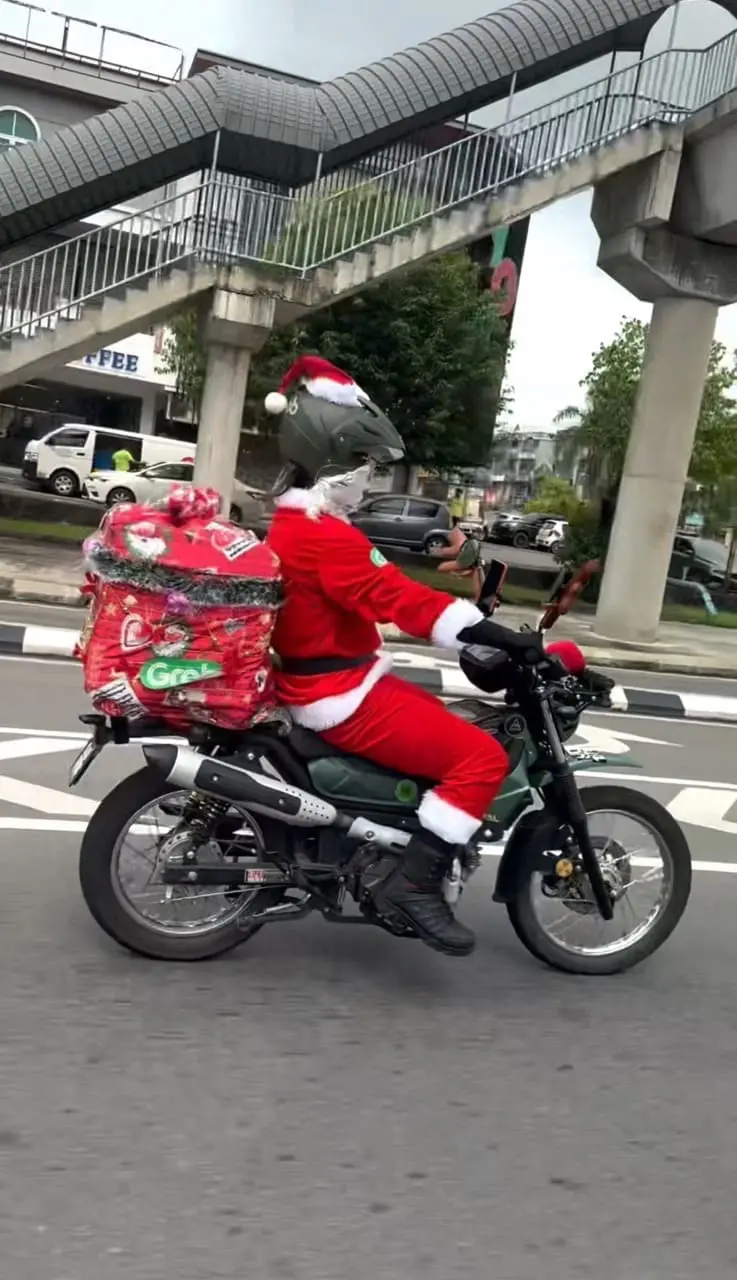 santa riding a motorbike