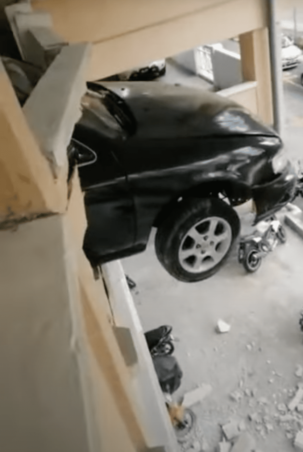 Car Left Half Hanging In A KL Car Park As Driver Step On Accelerator By Mistake 03