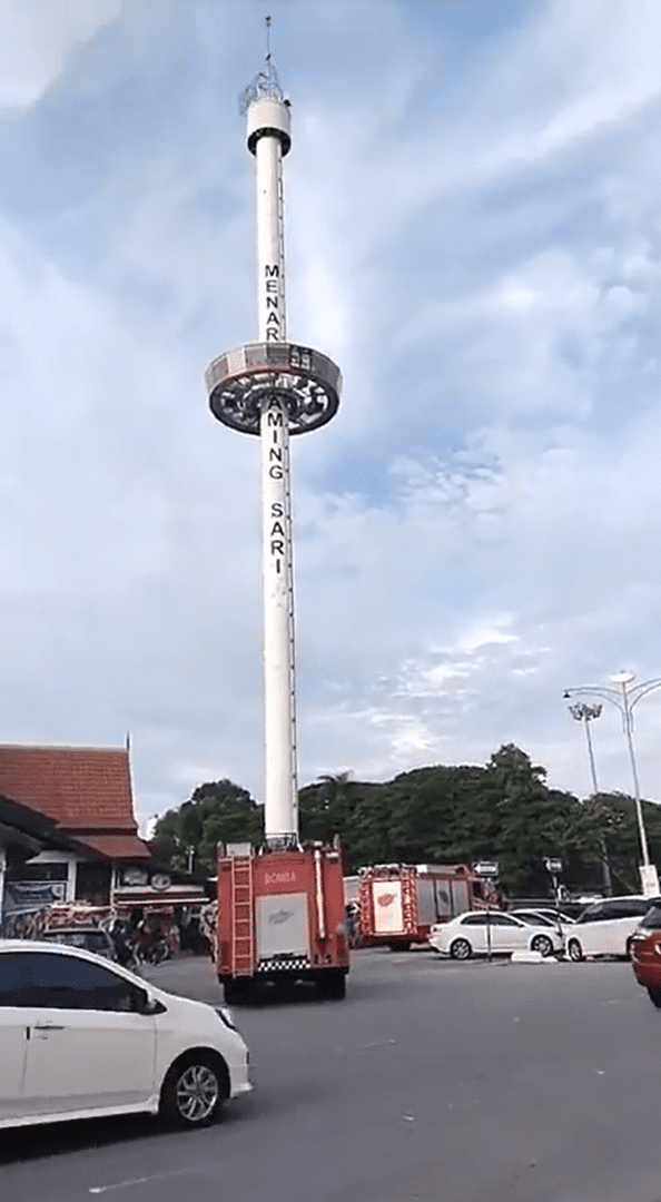 Bomba/ firemen arrived at Revolving Tower in Melaka