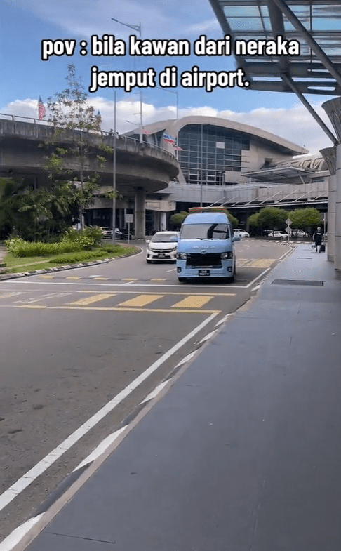 A vellfire car at airport entrance