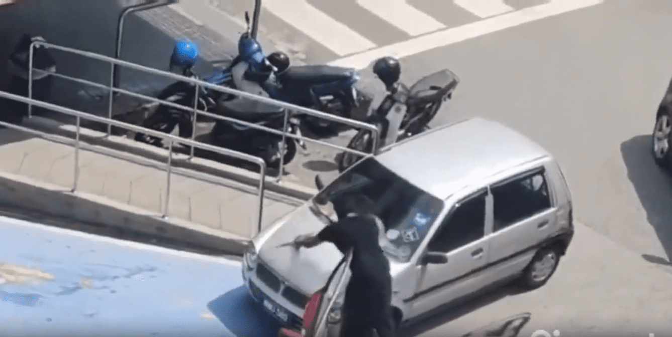 The taxi driver breaking the wiper of Kancil