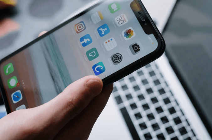 Person using Facebook app