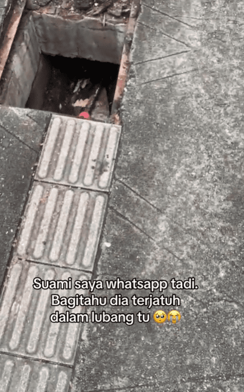 Giant hole along tactile walkway in KL