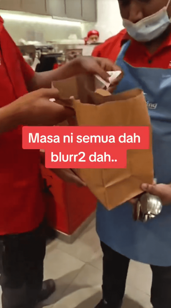 Restaurant staff checking wrong food order