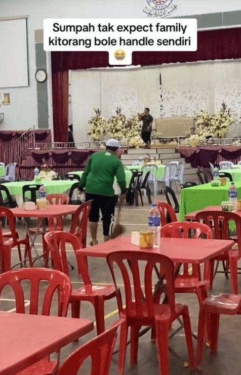M'sian man seen preparing hall for wedding
