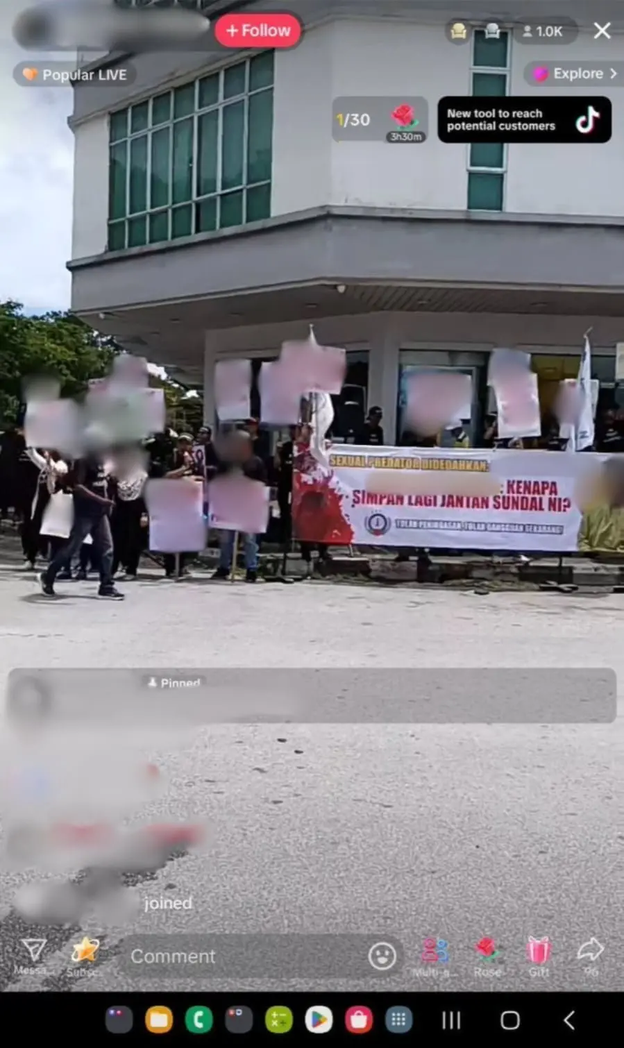 screenshot of a protest at a local bank