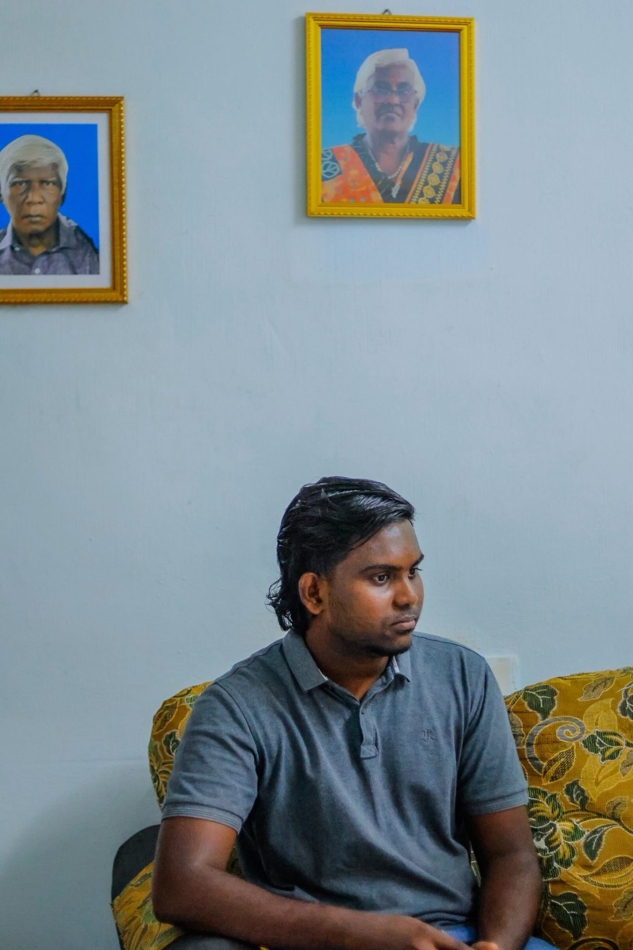 Selveston sitting at his home