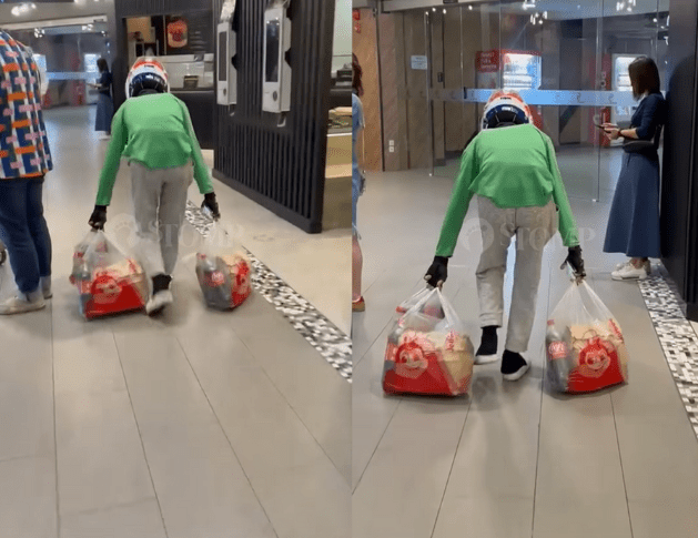 SG delivery rider drags food order across floor