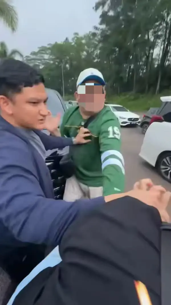 SG man beats M'sian man