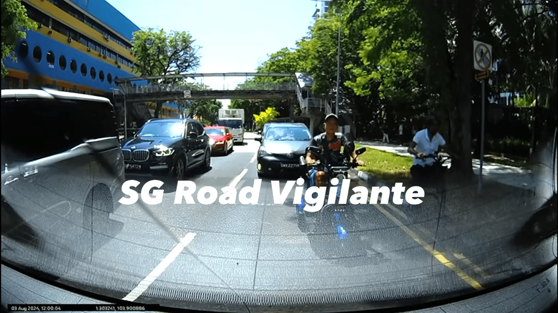 SG PMA rider waiting for cars to move